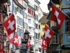 Zurich_Old street in Zurich decorated with flags for the Swiss National400x300